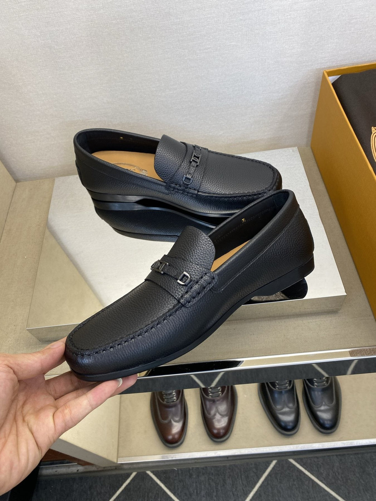 Tod's Black Leather Penny Loafers