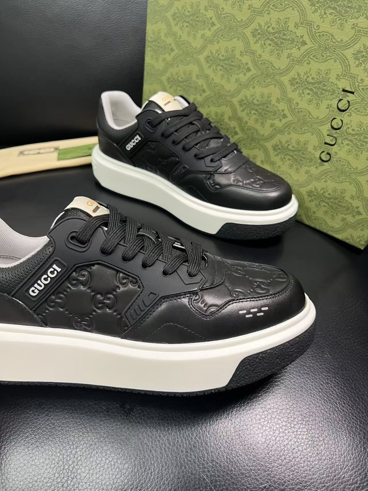 Gucci Embossed Low-Top Sneakers